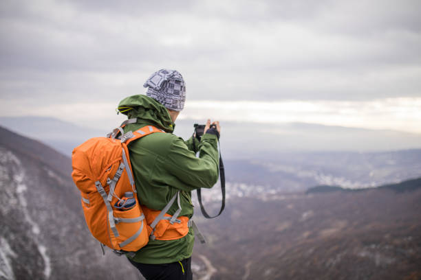 istock Photographer hiker in nature 899225464