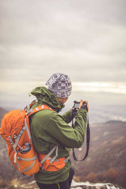 istock Photographer hiker in nature 899226208