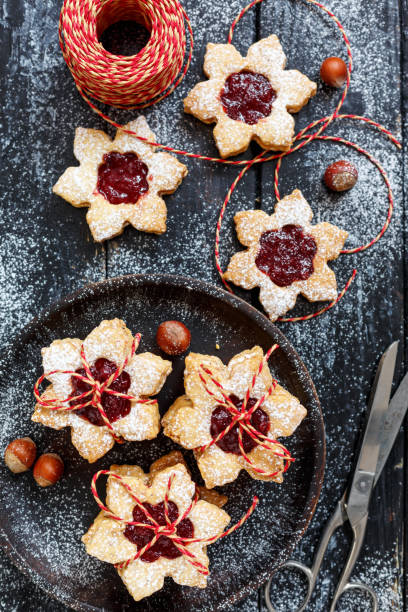 istock Stack of traditional Linzer cookies wrapped in colorful cord. 899226278