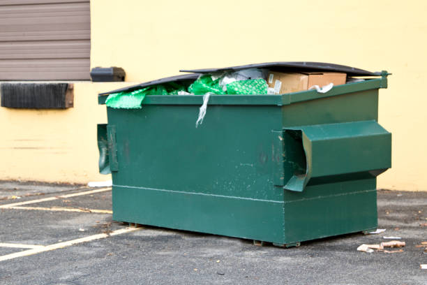 istock Industrial Garbage Bin full of garbage. 899226344