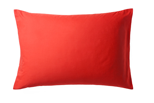 Red Pillow isolated on White Background. Top View of a Soft Colorful Pillow with Copy Space for Tex or Image