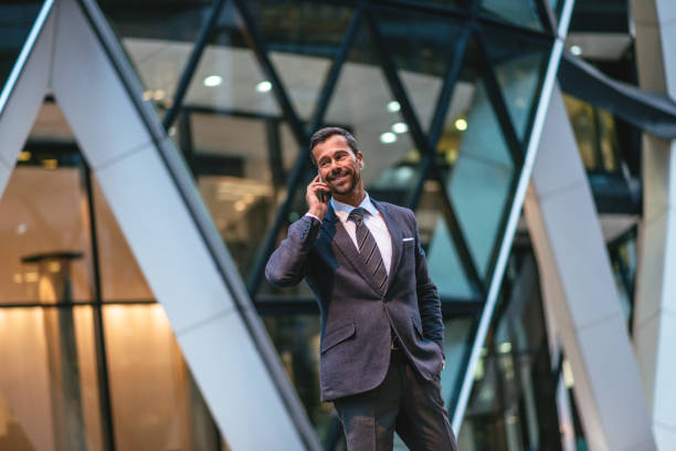 istock Successful business person using phone before the meeting 899230132