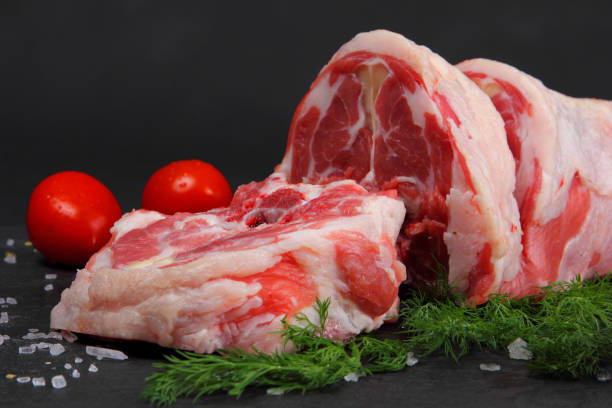 istock Raw Neck Meat on the Black Table 899233338