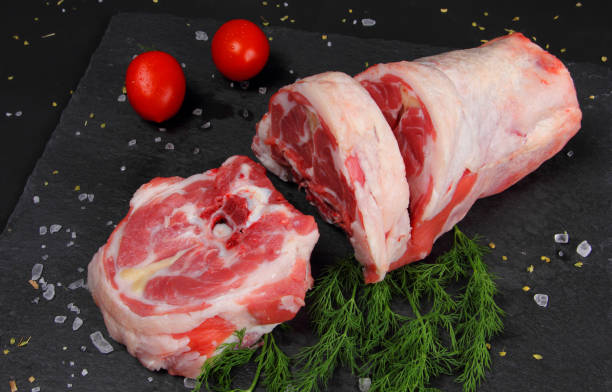 Raw Neck Meat on the Black Table