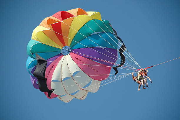 People parasailing.