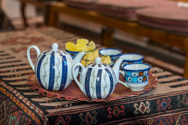 Teapots and cups in an traditional tea house, Iran