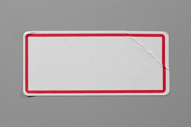 Stickers Label Close Up on Cardboard Background with Real Shadow.