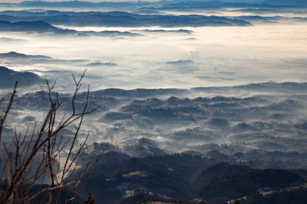 Ljubljana and Kranj in the fog from Krvavec Ljubljana and Kranj in the fog from Krvavec krvavec stock pictures, royalty-free photos & images