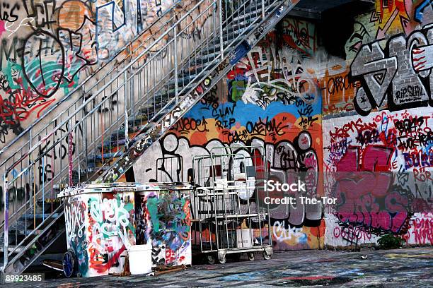 Graffiti Under Stairs Stock Photo - Download Image Now - Graffiti, Wall - Building Feature, City Life