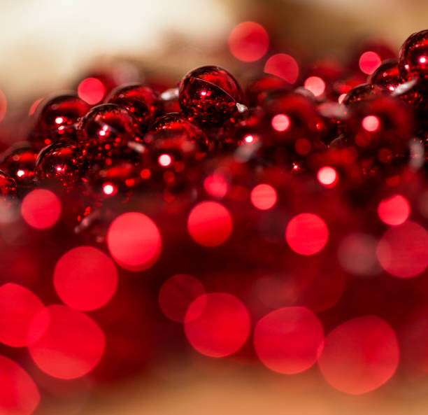istock Close up macro red shiny bead bokeh background 899238424