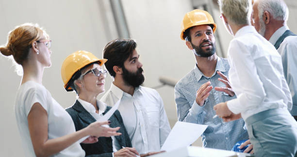 istock Industrial design team in a meeting. 899239190