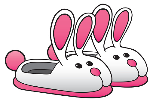 A pair of pink and white ready to wear bunny slippers