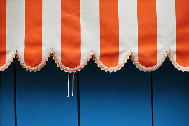 orange and white shelter curtain stock photo