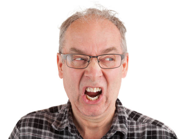 Enraged A man is furious about something. derange stock pictures, royalty-free photos & images