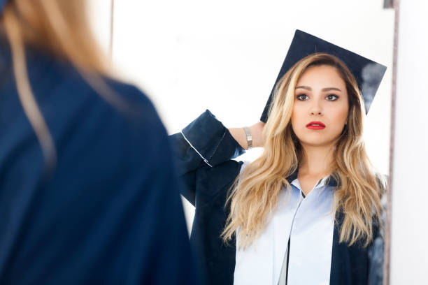 istock In front of Graduation woman 899243076
