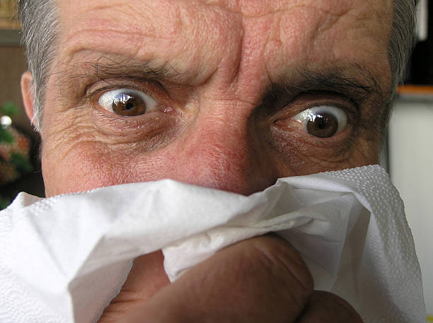 Man blowing his nose  #1 stock photo