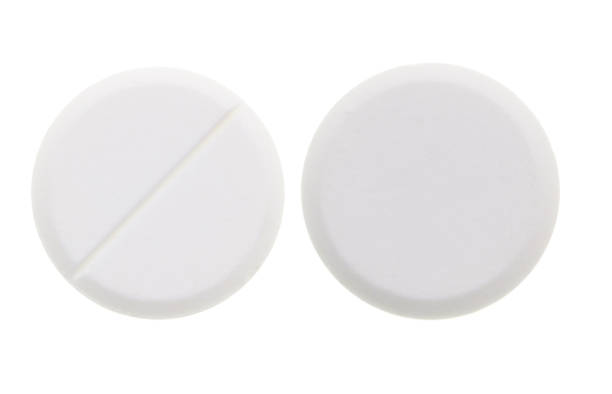 istock medical pills on white background 899250320