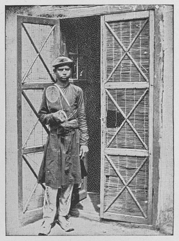 Postman in Colombo, British Ceylon during the british era. Vintage photo printed in halftone circa late 19th century. Colombo is now a part of Sri Lanka.