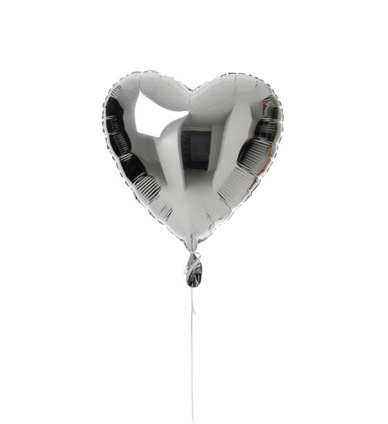 istock Single big  silver heart balloon object for birthday isolated 899252404