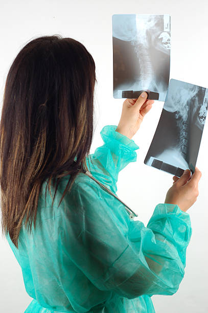 istock female doctor with x-ray 89925501