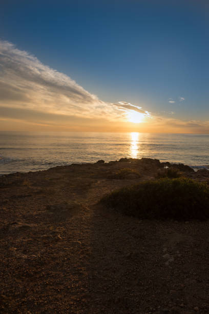 istock The calm sea in a very cloudy sunset 899258892