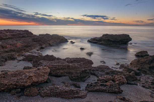 istock The calm sea in a very cloudy sunset 899258894