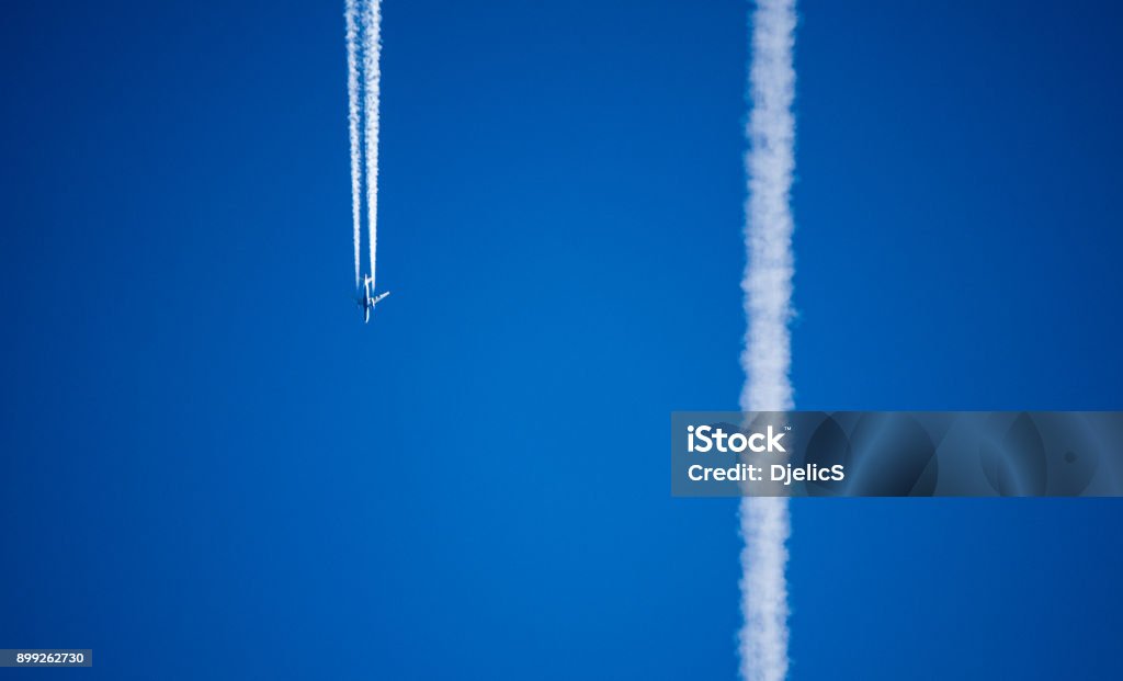 Chemtrailing the sky Conspiracy Stock Photo