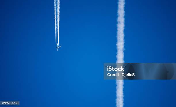 Chemtrailing The Sky Stock Photo - Download Image Now - Conspiracy, Stratosphere, Abstract