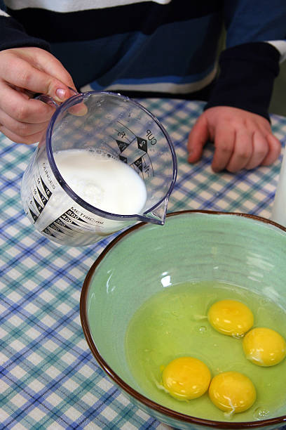 Pouring Milk stock photo