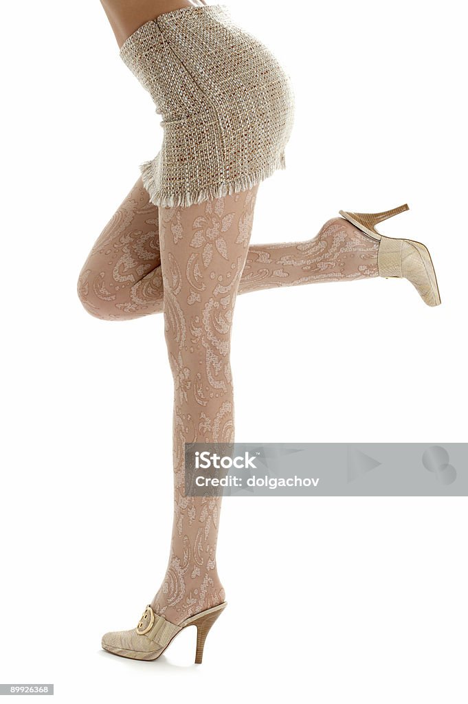 legs and back of lady in sacking skirt  Adult Stock Photo