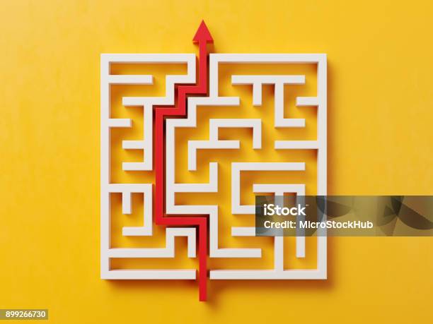 Red Path Across A White Maze On Yellow Background Stock Photo - Download Image Now - Maze, Three Dimensional, Solution