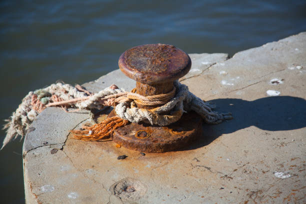 istock Mooring rope on sea water background 899267976