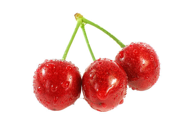 istock Three red cherries in drops of water. 89927061