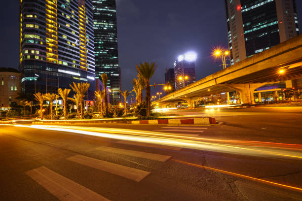 istock Night scene of modern city with light trails. 899276710
