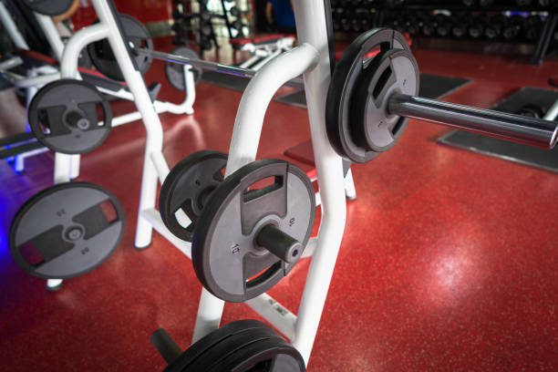 istock Rod and weights in the gym 899279108