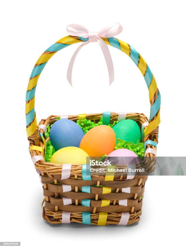 Easter Basket Front Easter Basket with Colored Eggs Isolated on White Background. Easter Egg Stock Photo