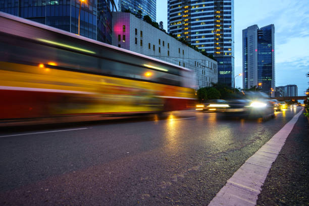 istock Night scene of modern city with light trails. 899280226