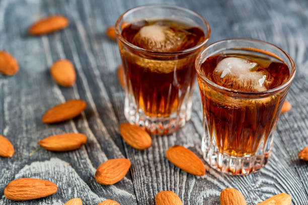 istock Italian amaretto liqueur with dry almonds 899283320