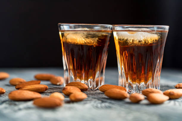 istock Italian amaretto liqueur with dry almonds 899283348