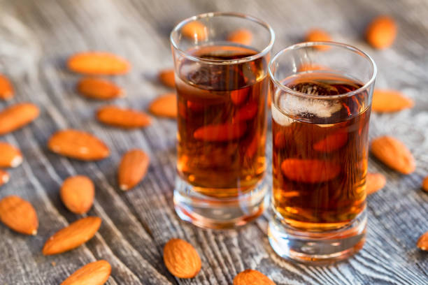istock Italian amaretto liqueur with dry almonds 899283368