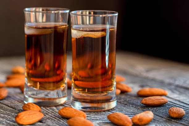 istock Italian amaretto liqueur with dry almonds 899283380