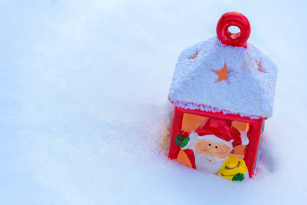 istock Red colored Christmas lantern in snow 899284472
