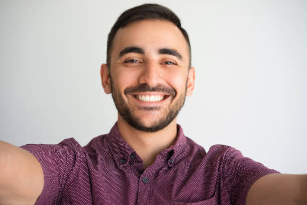 istock Happy Handsome Man Taking Selfie Photo 899284810