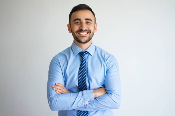 istock Smiling Successful Young Leader with Arms Crossed 899287856