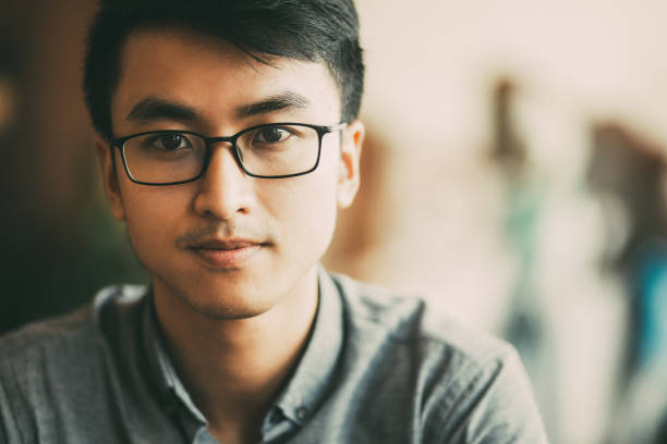 istock Confident Asian businessman in eyeglasses 899288230