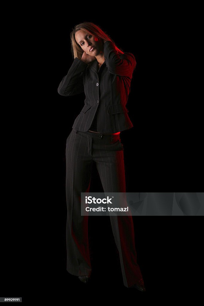 Mujer de negocios en la oscuridad - Foto de stock de A la moda libre de derechos