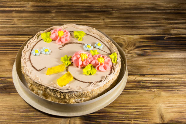 istock Cardboard box with Kiev cake with cream, nuts and meringue 899295698