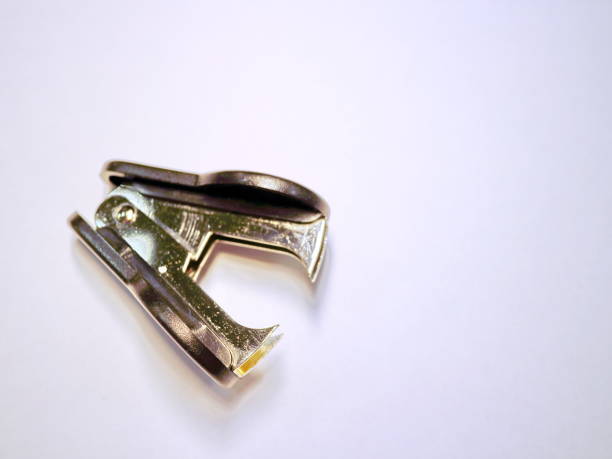 istock shiny office anti-stapler on white background 899296028