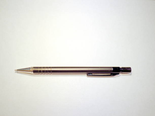 istock stationery pen and pencil on white background 899296098