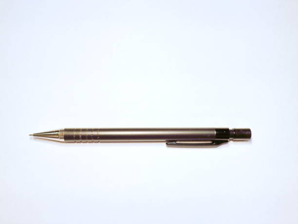 istock stationery pen and pencil on white background 899296134